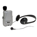 A Personal Sound Amplifier that looks like a small walkie-talkie with a corded headset attached to it